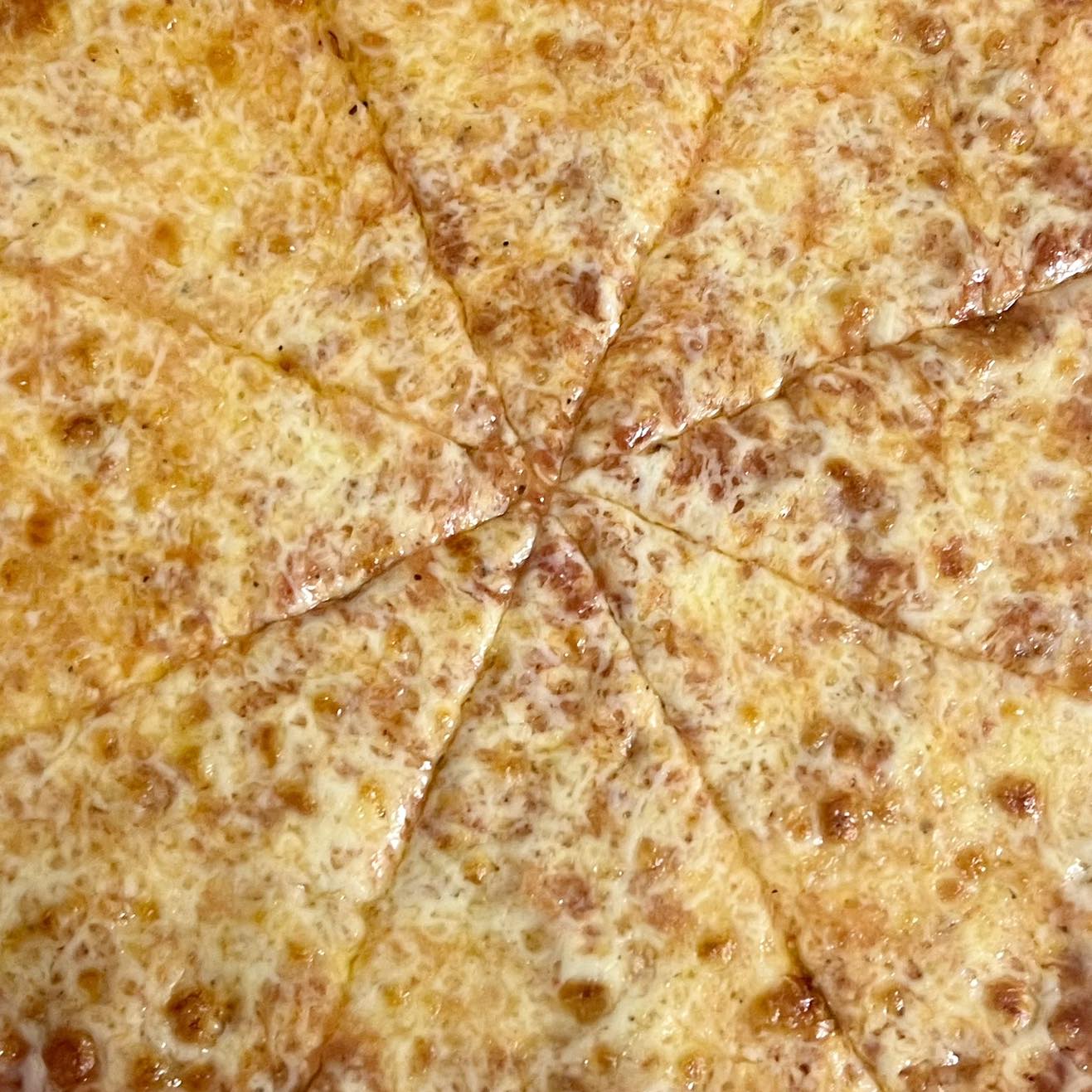 Melty cheese pizza close-up